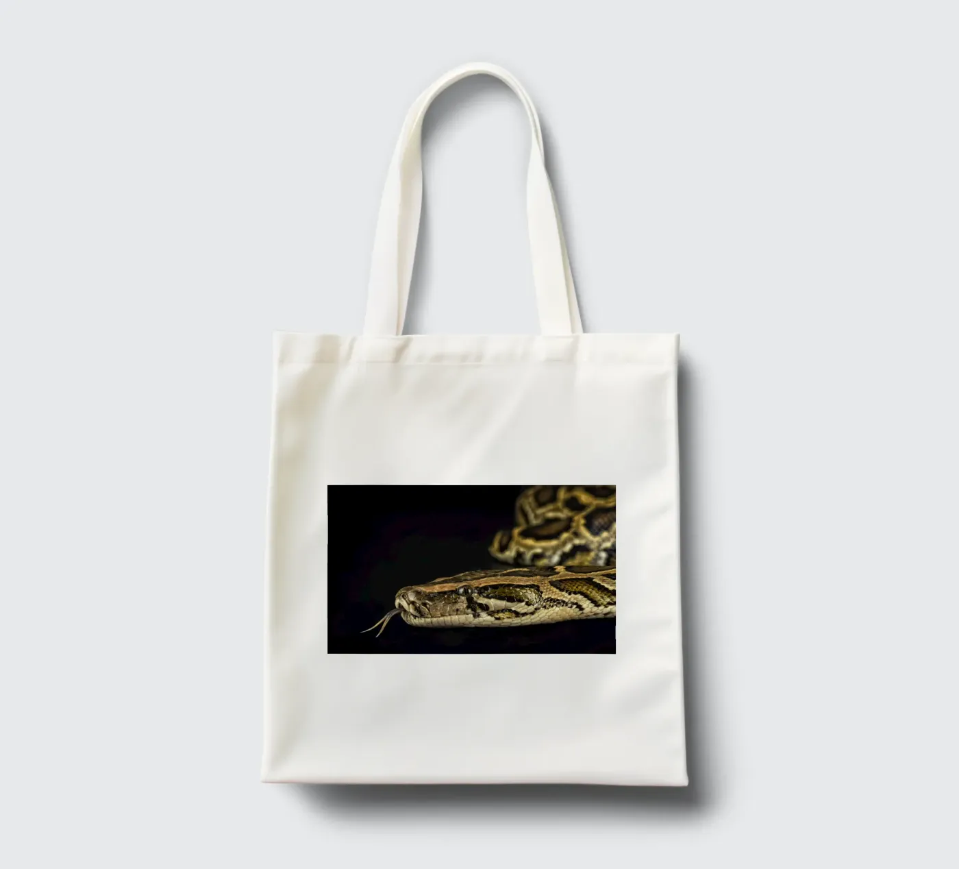 Pitone Immagine di testa borsa in juta da Curious Collections by Marielle Leenders