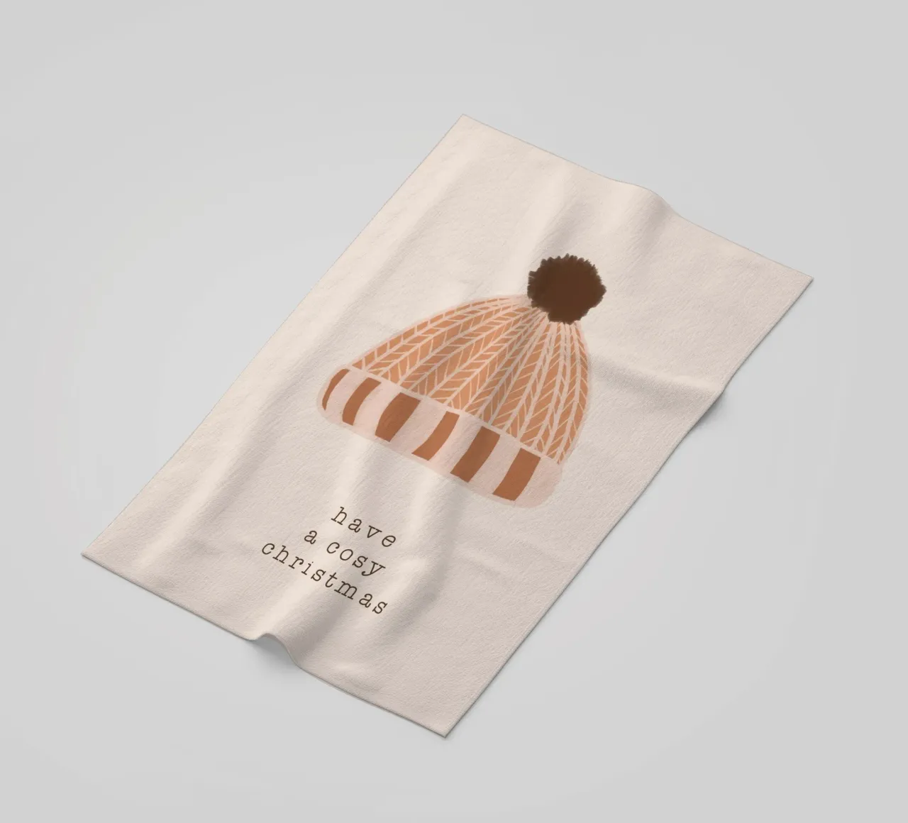 Blush - Un Natale accogliente telo mare da Orara Studio