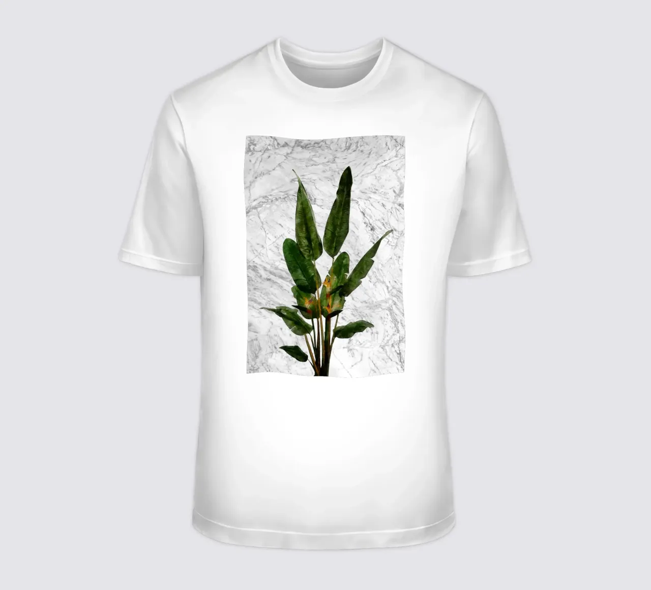 Pianta di Uccello del Paradiso su parete di marmo bianco t-shirt da amini54
