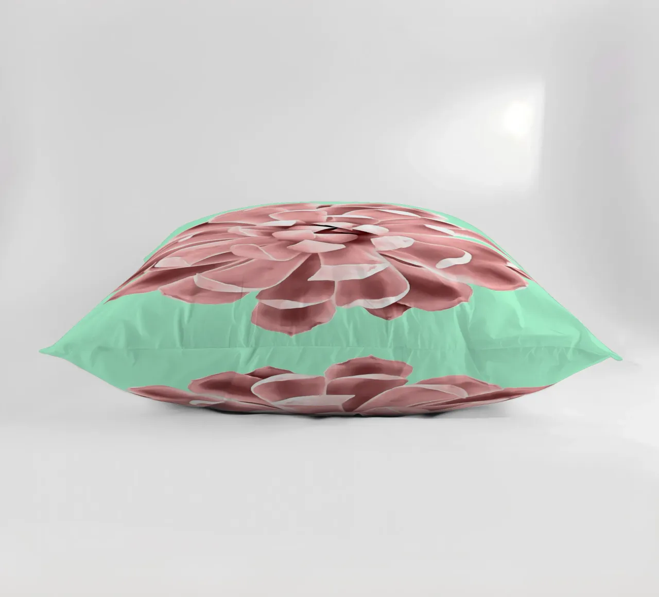 Succulente rosa su parete verde acqua cuscino da amini54