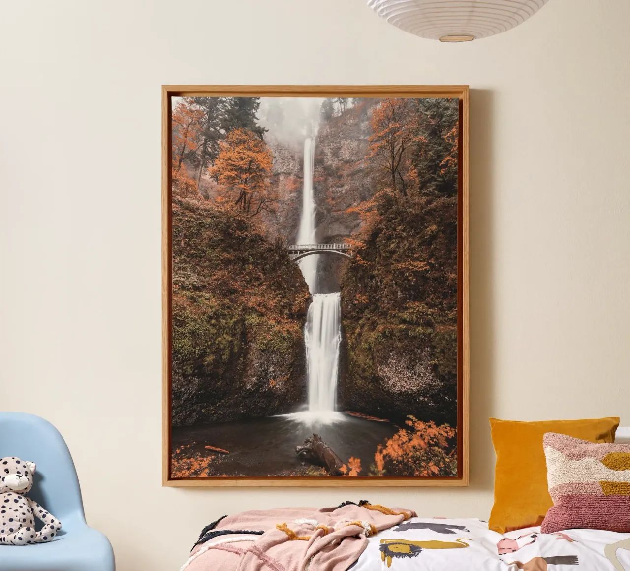 Autumnal waterfall with vintage-style bridge canvas with Floater frame by Whole©