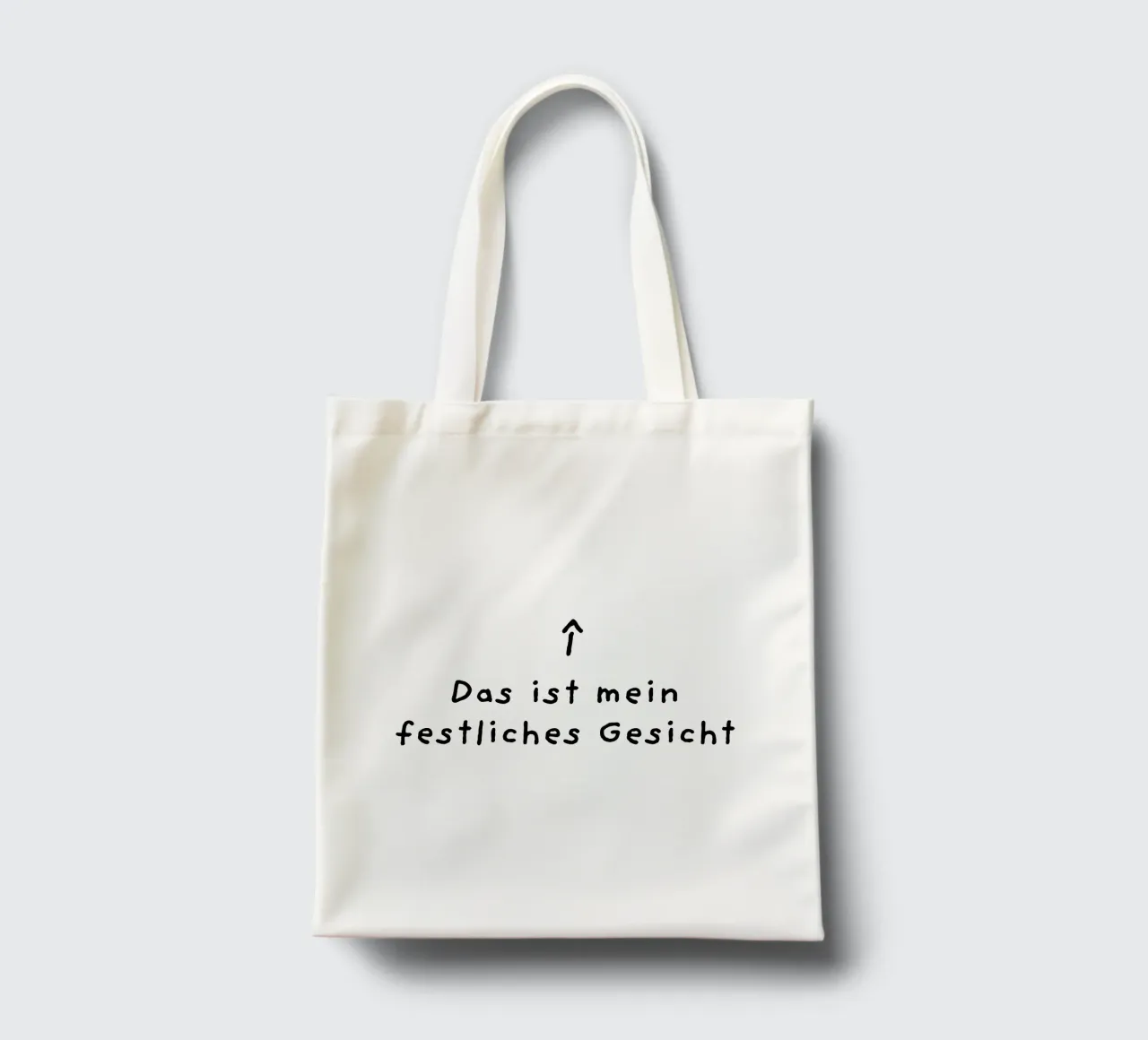 This is my festive face tote bag by LOVS DESIGN