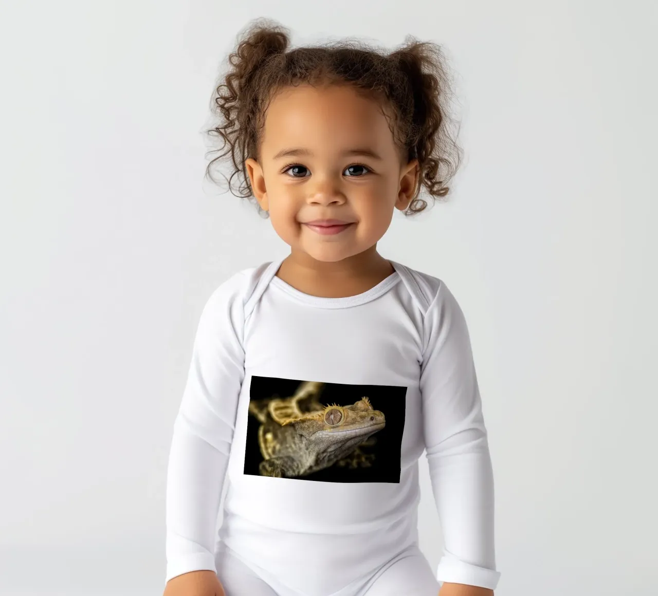 Crested Gecko long-sleeve baby romper by Curious Collections by Marielle Leenders