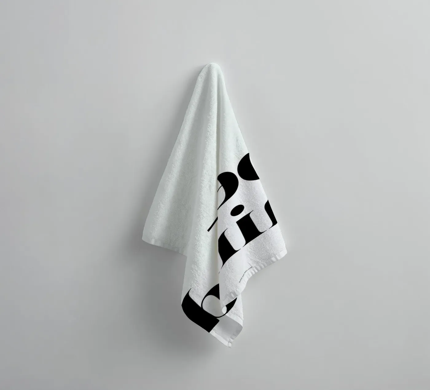 Behind badhanddoek van The Wall Shop