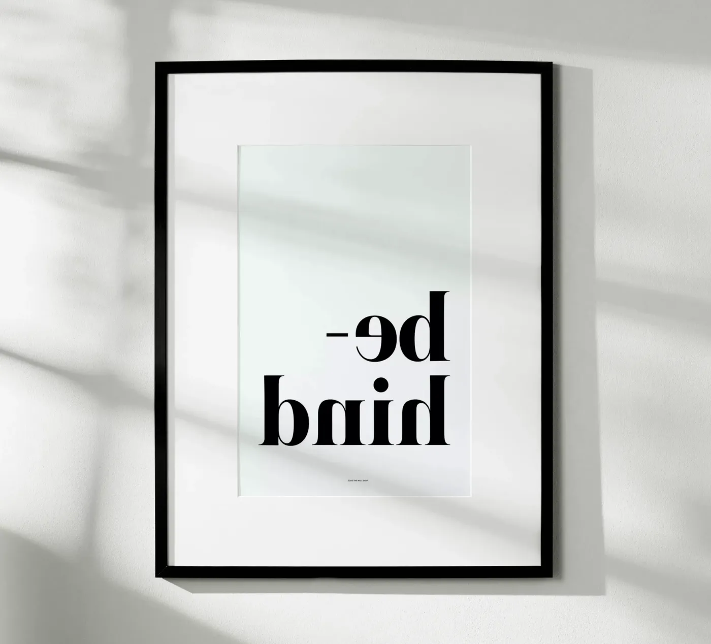 Behind poster van The Wall Shop