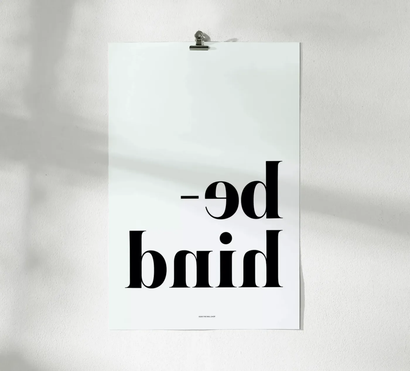 Behind poster van The Wall Shop
