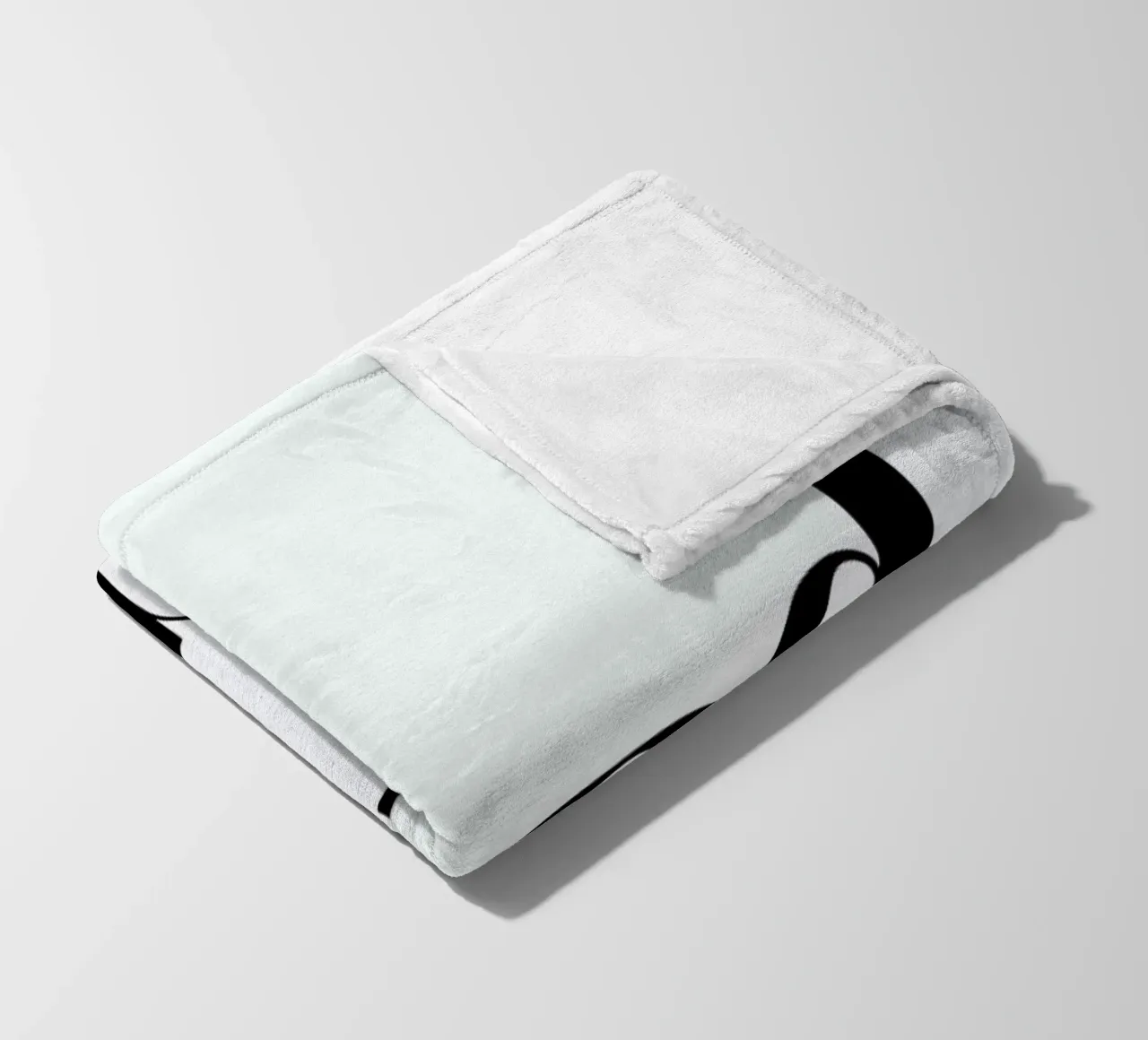 Behind fleecedeken van The Wall Shop