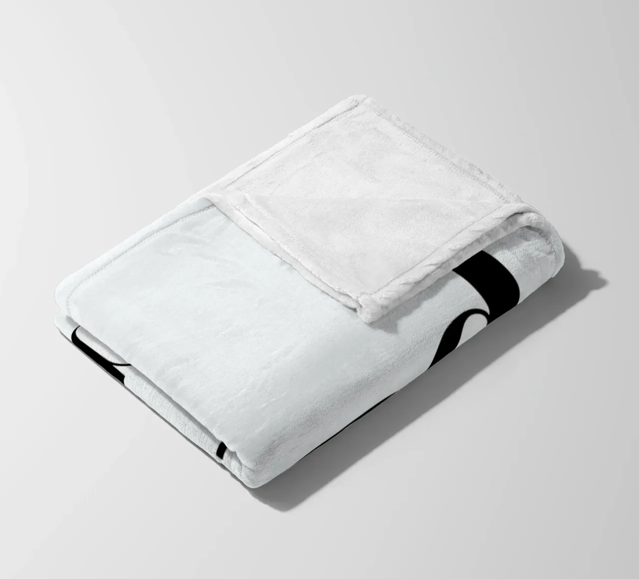 Behind fleecedeken van The Wall Shop