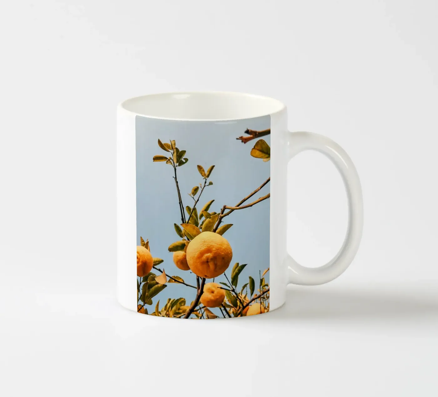 Orange ceramic mug by Vale Studio