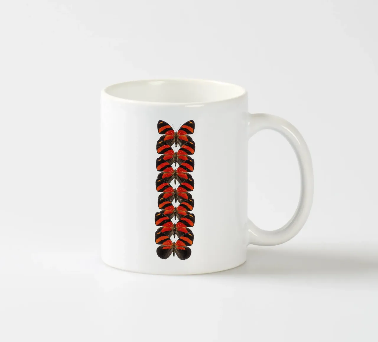Rosso radioso: Piccole farfalle tazza in ceramica da Curious Collections by Marielle Leenders