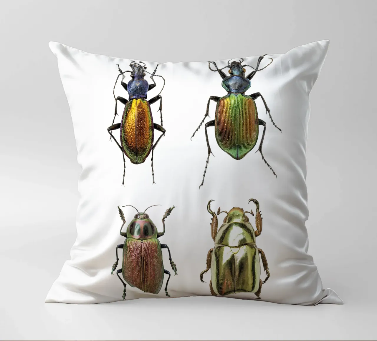 Glimmering Jewels: Four Shimmering Beetles decorative cushion by Curious Collections by Marielle Leenders