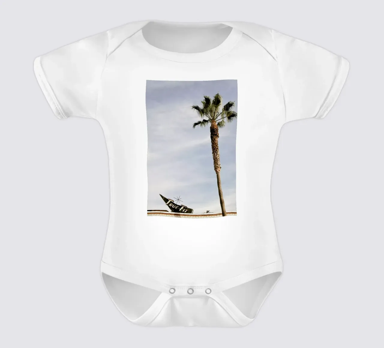 True Fit short-sleeve baby romper by Marc Gruninger