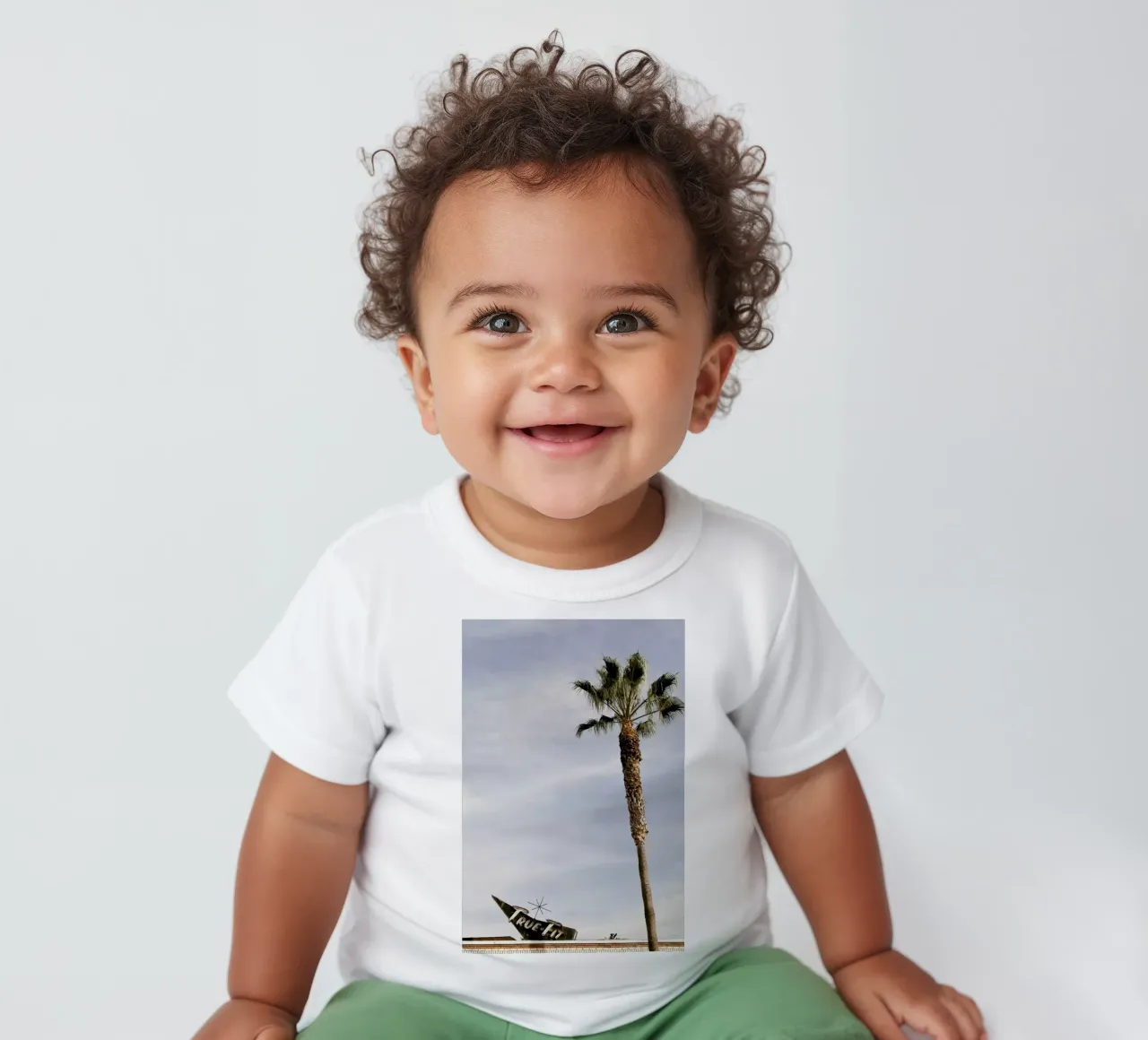 True Fit baby t-shirt by Marc Gruninger