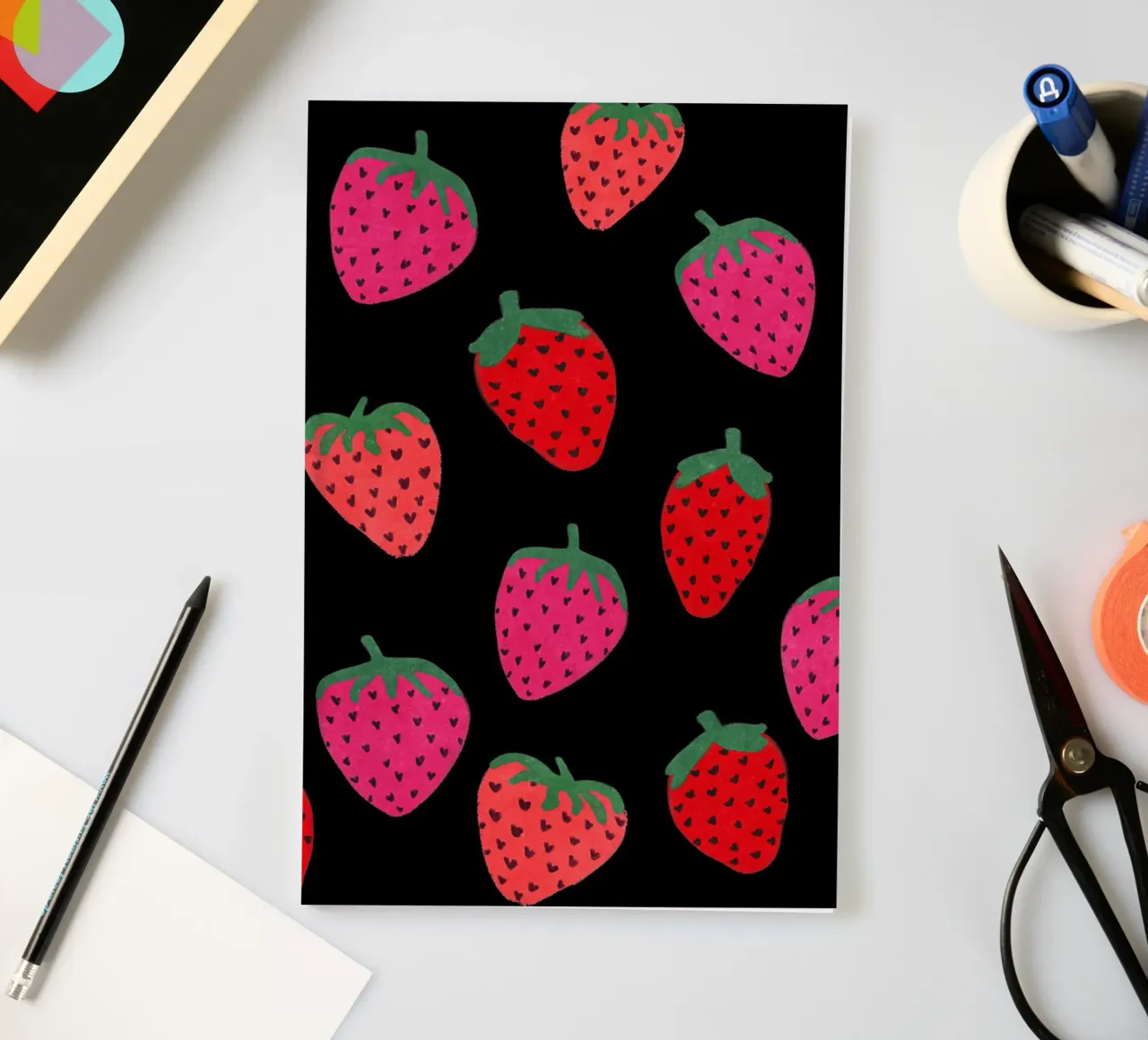 Strawberry Pattern on black notebook by Illustration Raissa Oltmanns