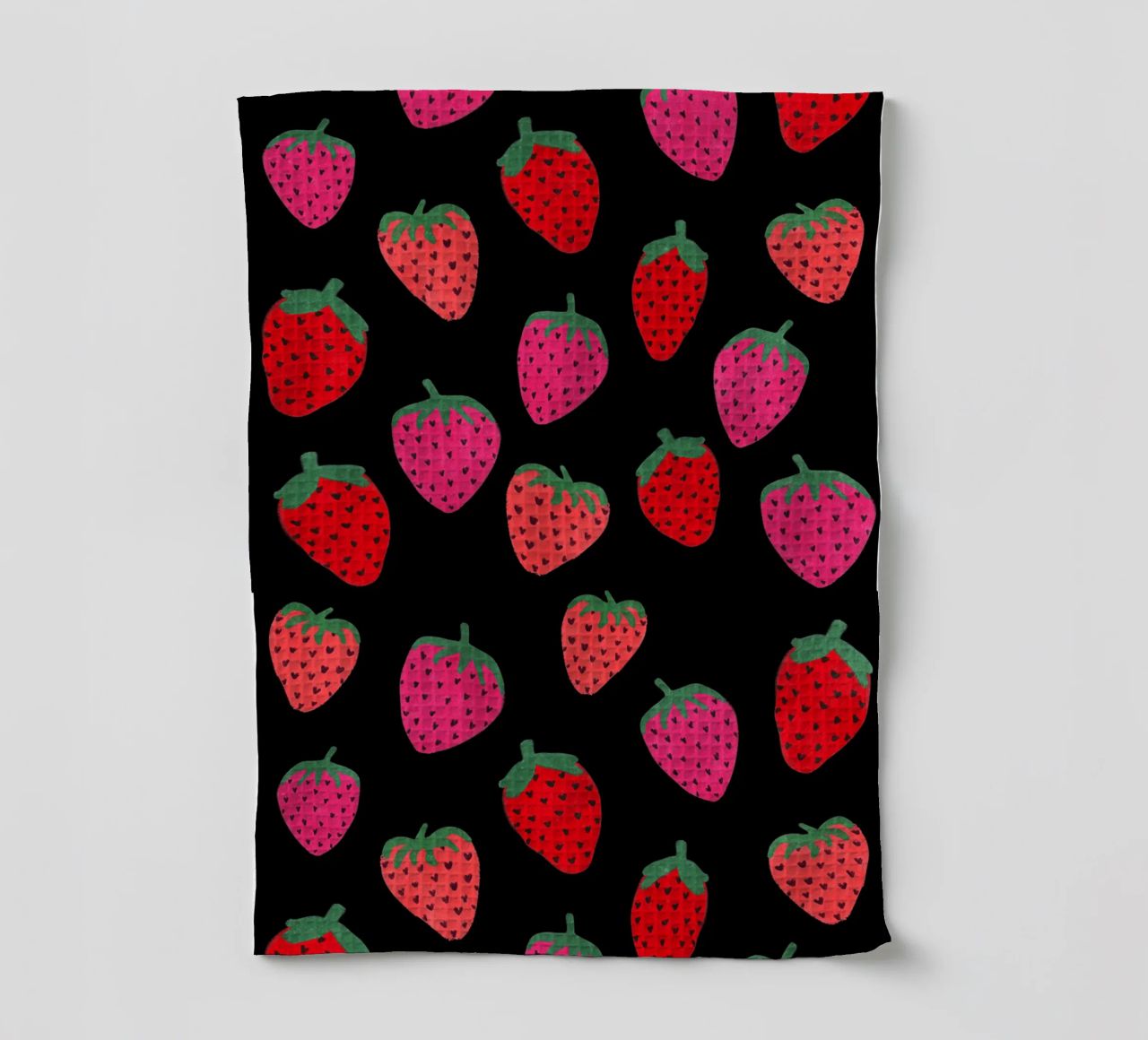 Strawberry Pattern on black tea towel by Illustration Raissa Oltmanns
