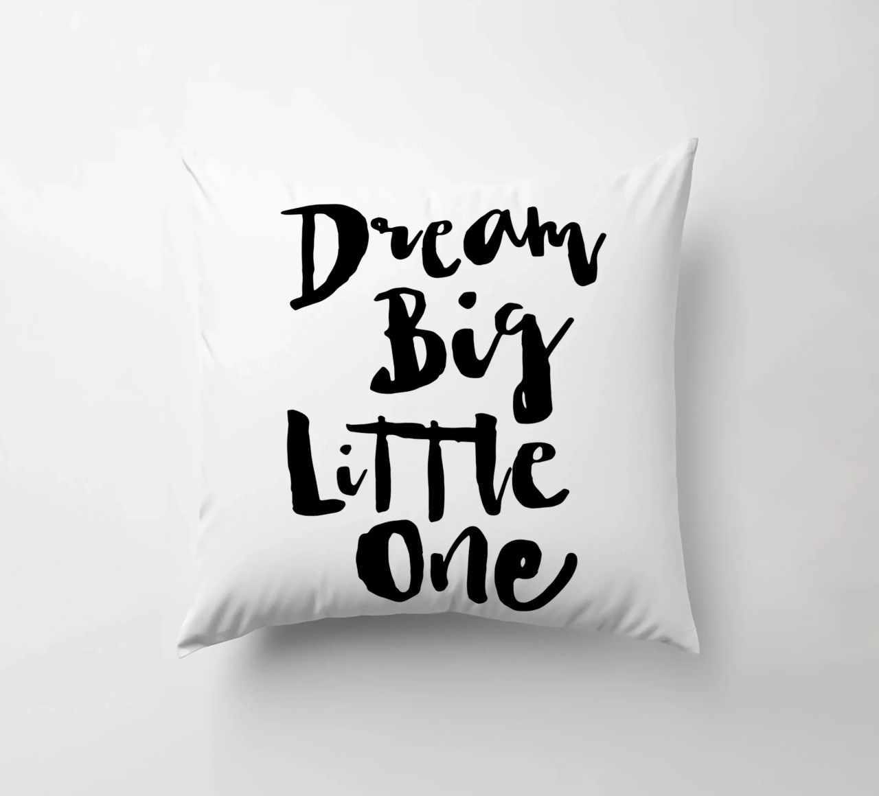 Sogna in grande piccolo in bianco e nero cuscino da THE MOTIVATED TYPE
