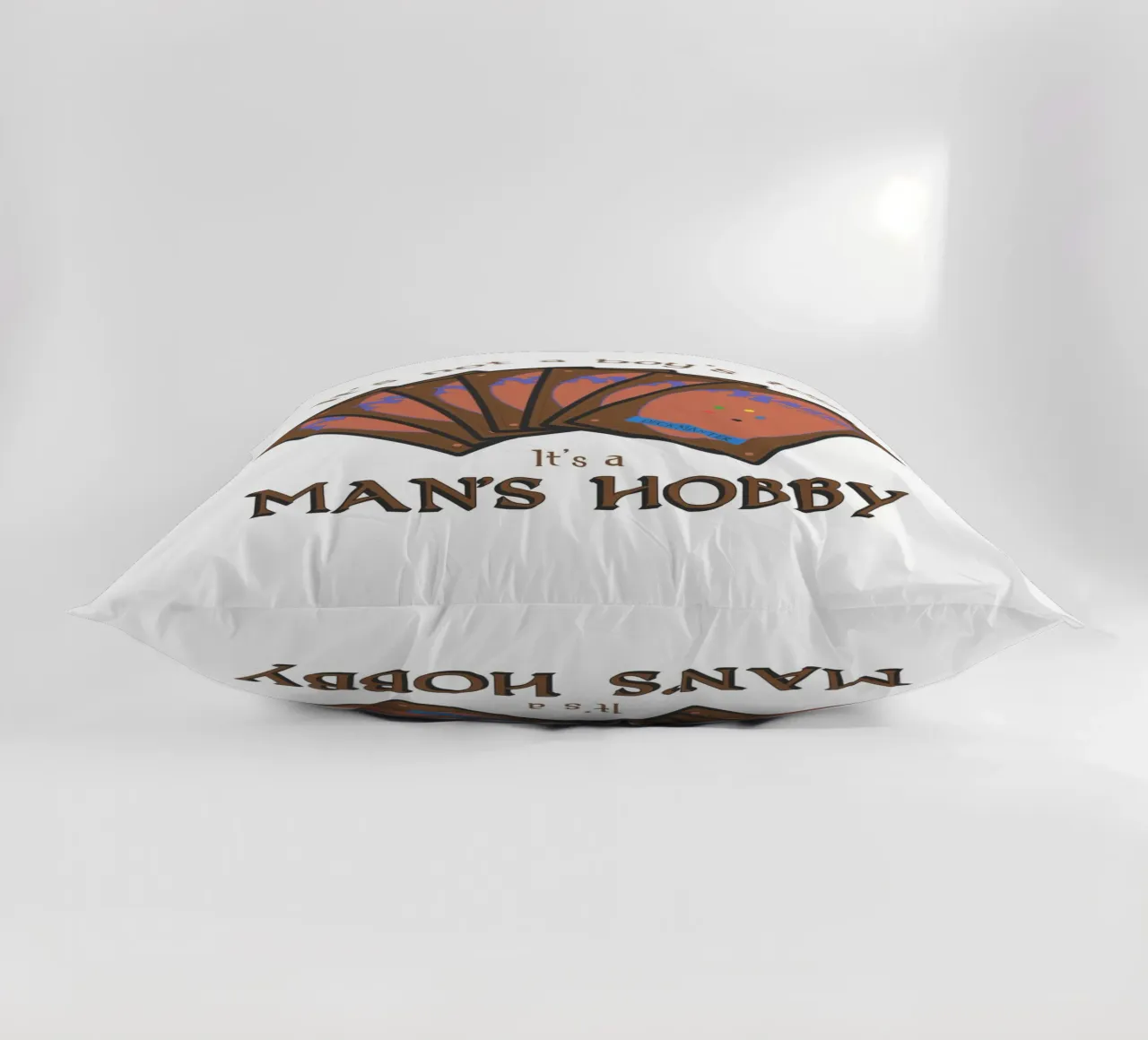 Magic it's not a boy's toy. It's a man's hobby decorative cushion by Loobs