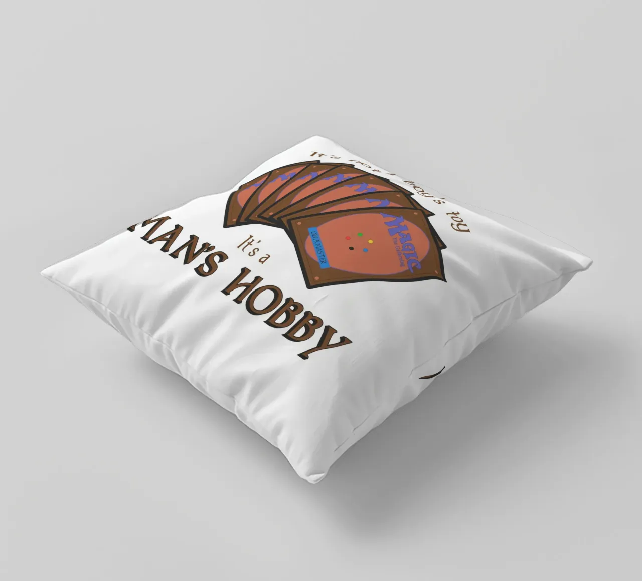 Magic it's not a boy's toy. It's a man's hobby decorative cushion by Loobs