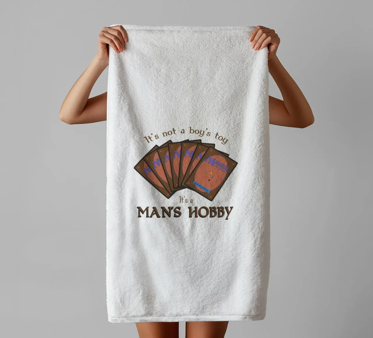 Magic it's not a boy's toy. It's a man's hobby towel by Loobs