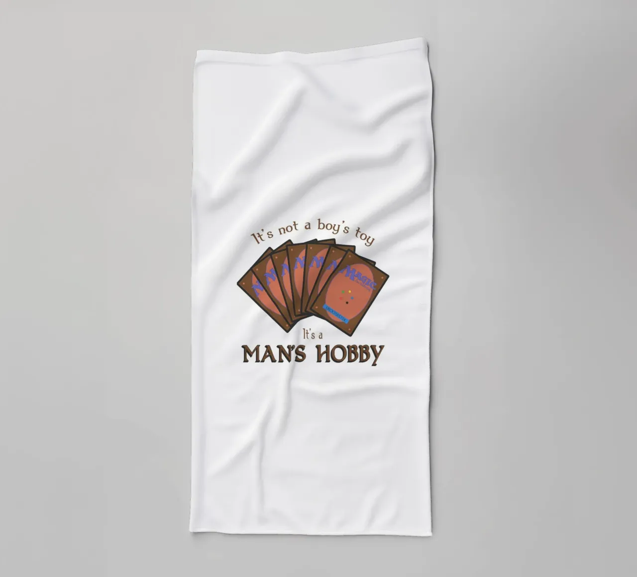 Magic it's not a boy's toy. It's a man's hobby towel by Loobs