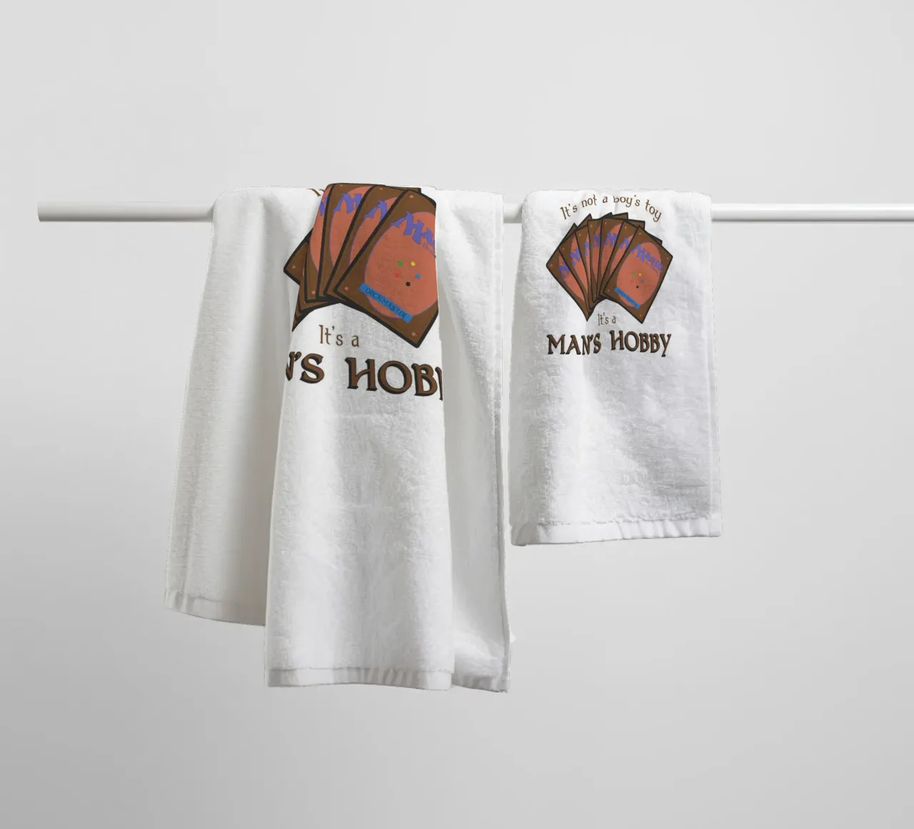 Magic it's not a boy's toy. It's a man's hobby towel by Loobs