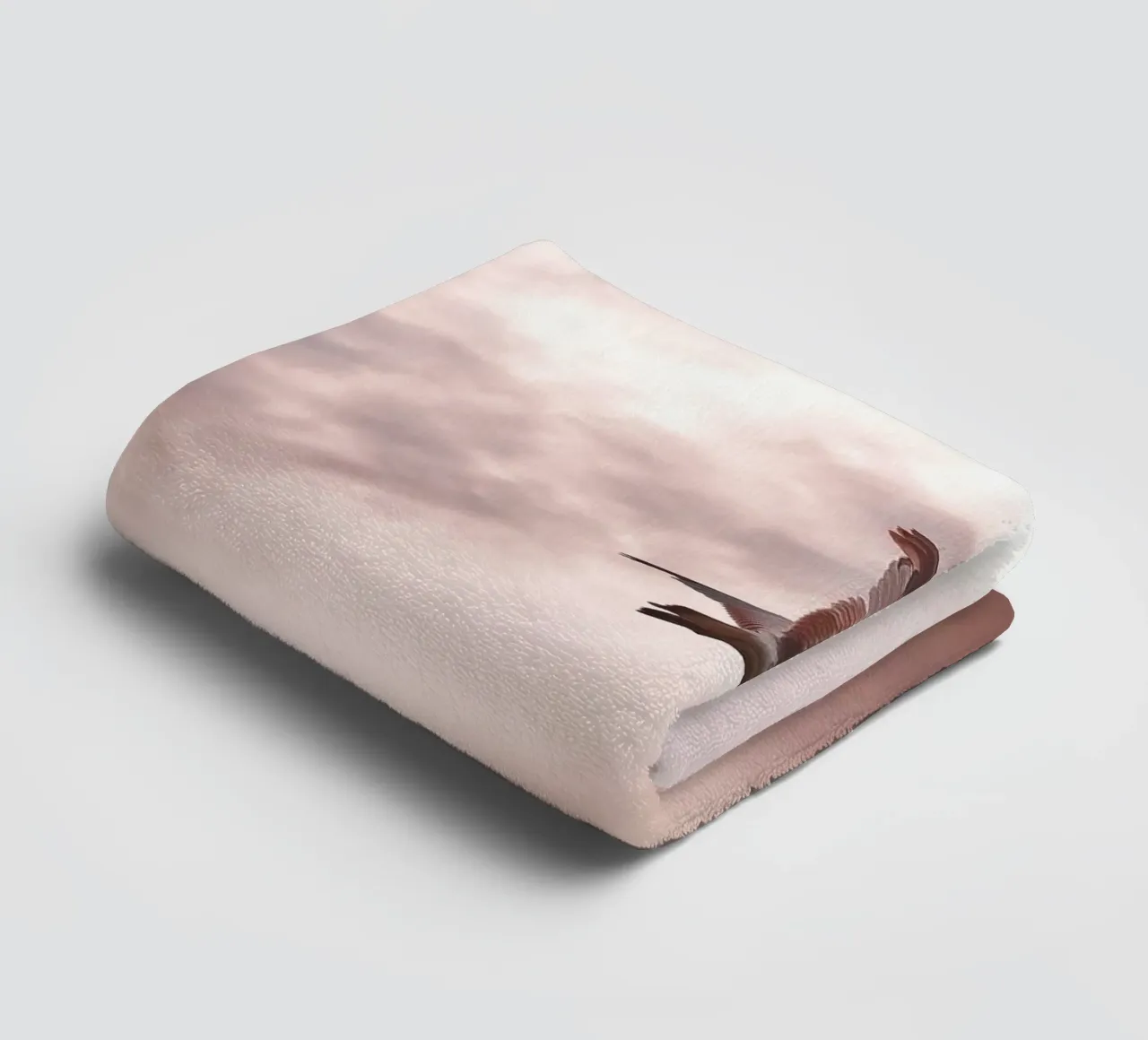 Freedom in flight - seagull in front of a rosy sky towel by Whole©