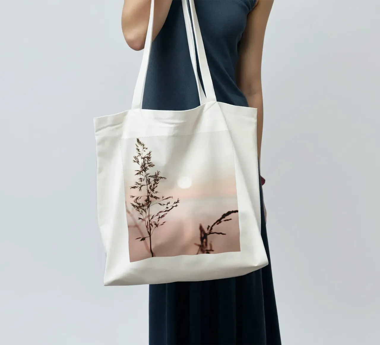 Grasses in the sunset - the tranquillity of nature tote bag by Whole©