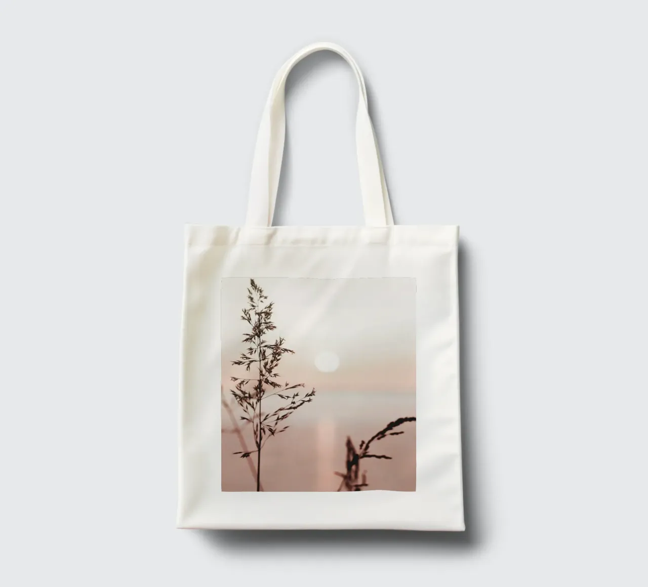 Grasses in the sunset - the tranquillity of nature tote bag by Whole©
