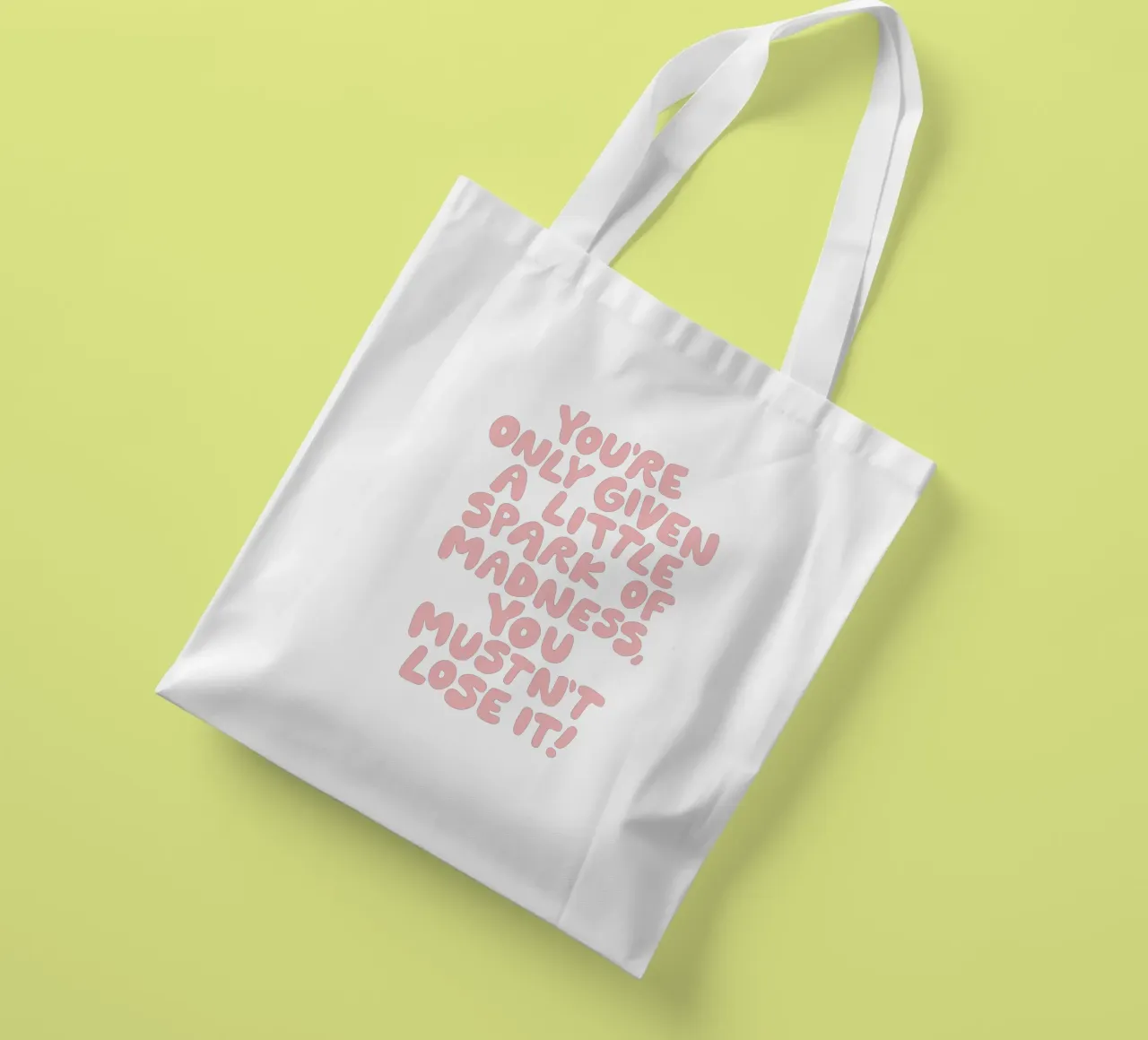 On ne vous donne qu'une petite étincelle de folie qu'il ne faut pas perdre tote bag de THE MOTIVATED TYPE