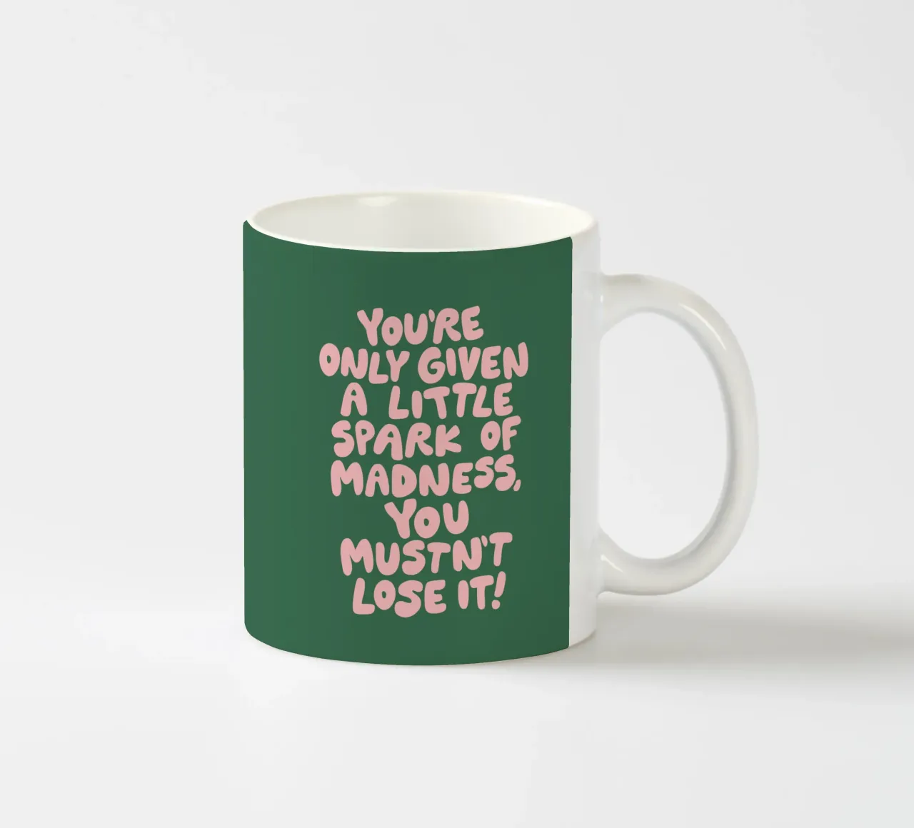 On ne vous donne qu'une petite étincelle de folie qu'il ne faut pas perdre mug en céramique de THE MOTIVATED TYPE
