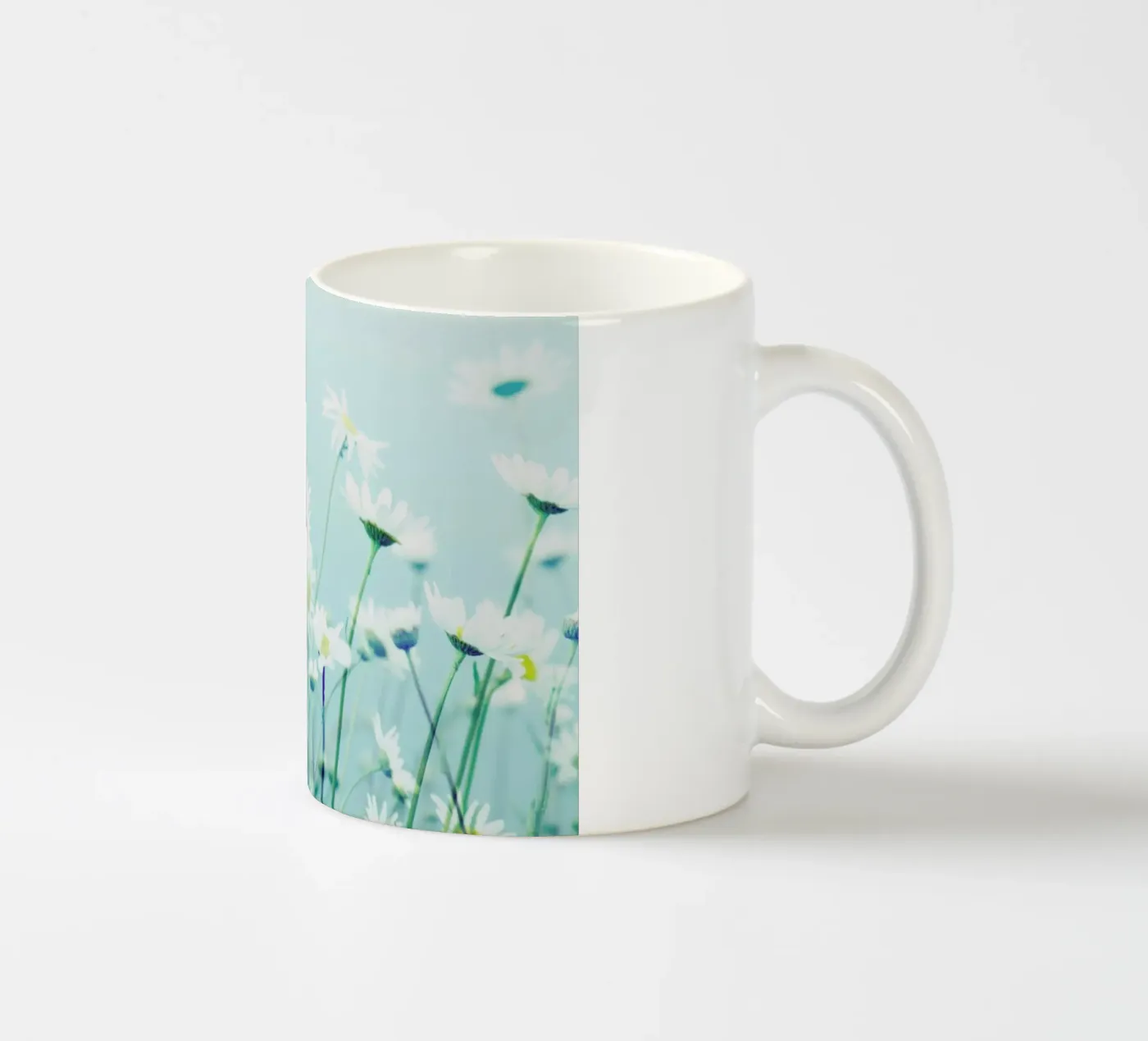 Dancing Daisies ceramic mug by Robin Delean