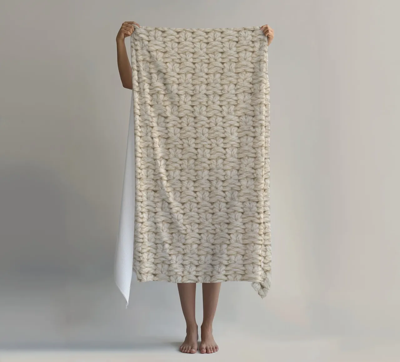 Morbida semplicità: Modello a maglia bianca telo mare da Curious Collections by Marielle Leenders
