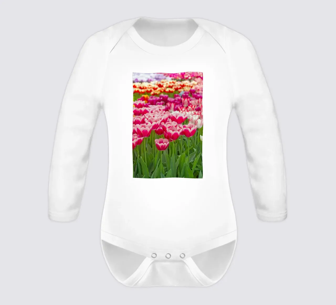 Fields of Joy: Vibrant Tulips in Bloom long-sleeve baby romper by Curious Collections by Marielle Leenders