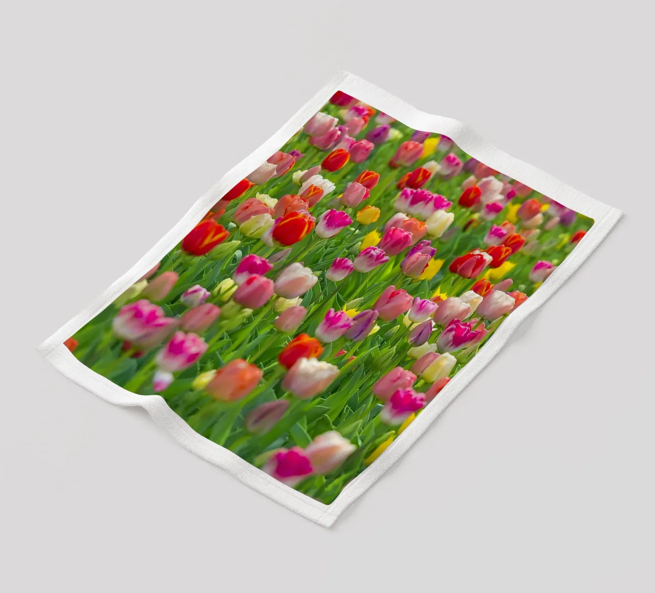 A Symphony of Color: Mixed Tulips in Bloom fleece blanket by Curious Collections by Marielle Leenders
