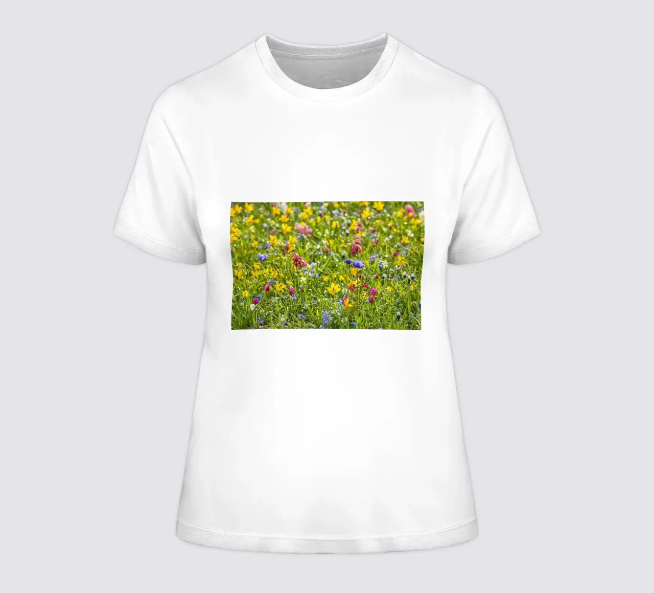A Symphony of Color: Field of Mixed Flowers t-shirt da donna da Curious Collections by Marielle Leenders
