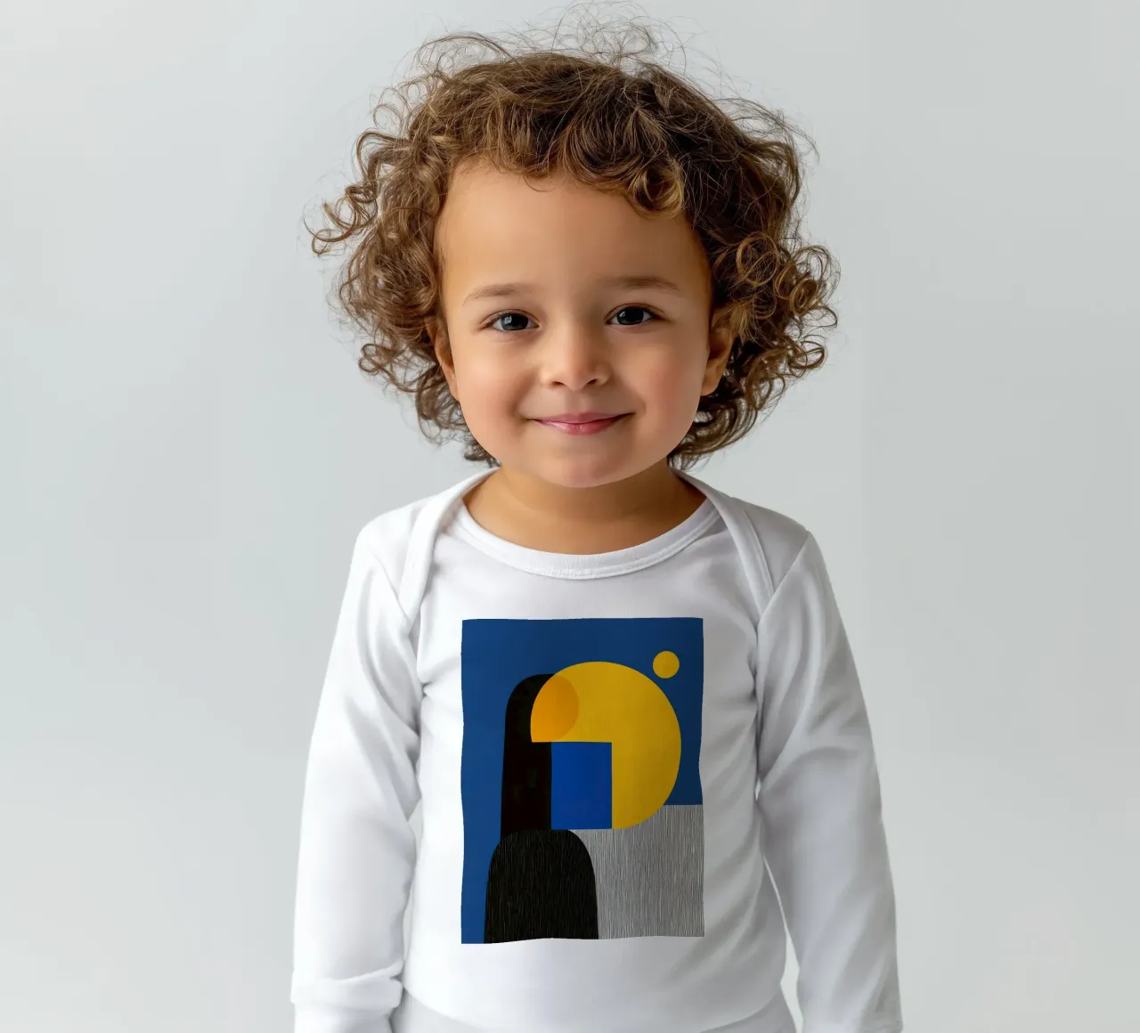 Geometric Sun long-sleeve baby romper by Geometric