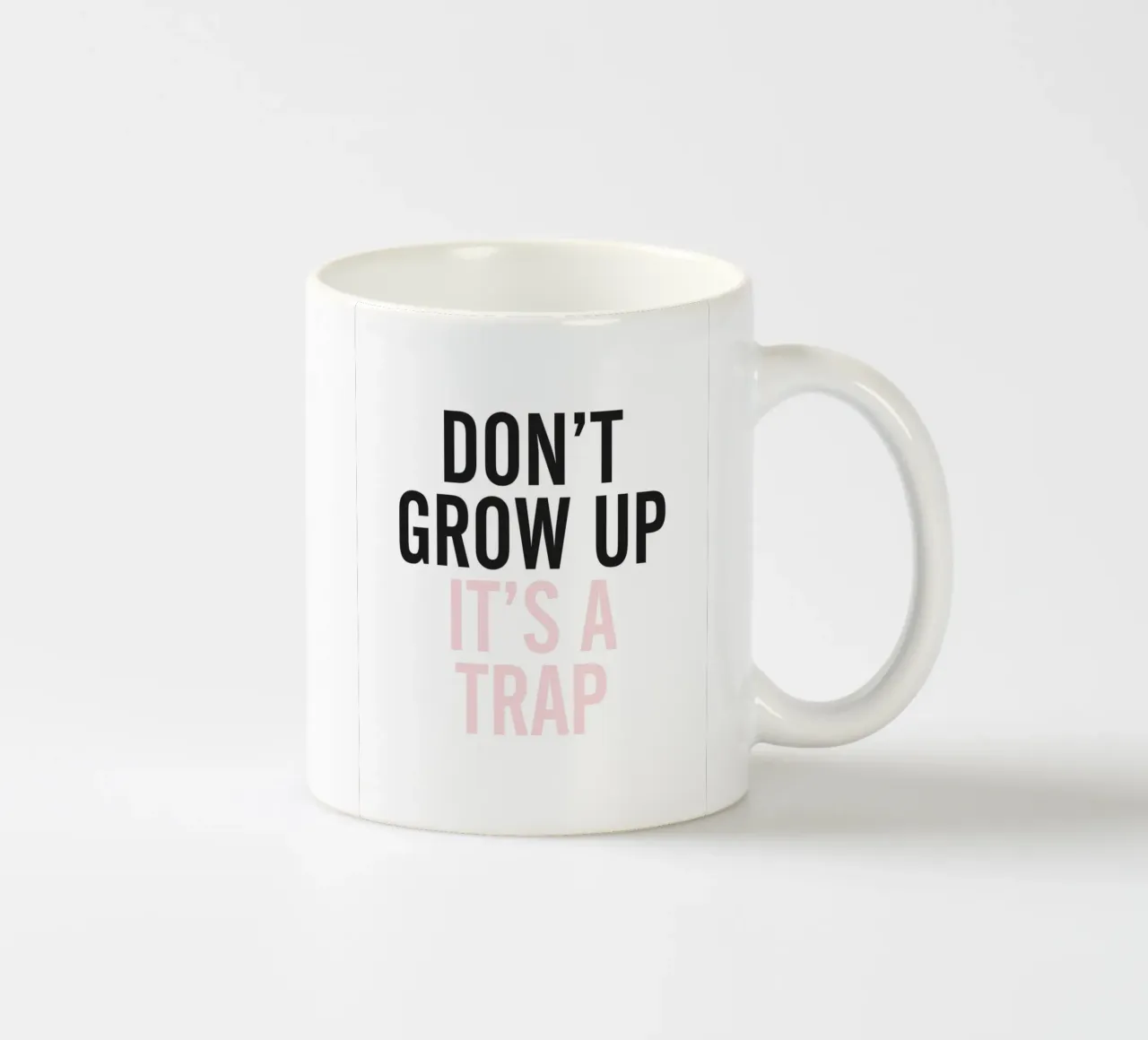 Don't Grow Up - Tipografia umoristica di design tazza in ceramica da Whole©