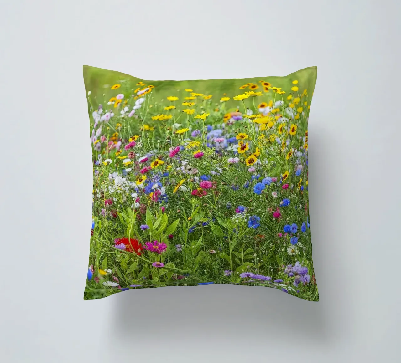 Nature’s Canvas: A Wildflower Symphony decorative cushion by Curious Collections by Marielle Leenders