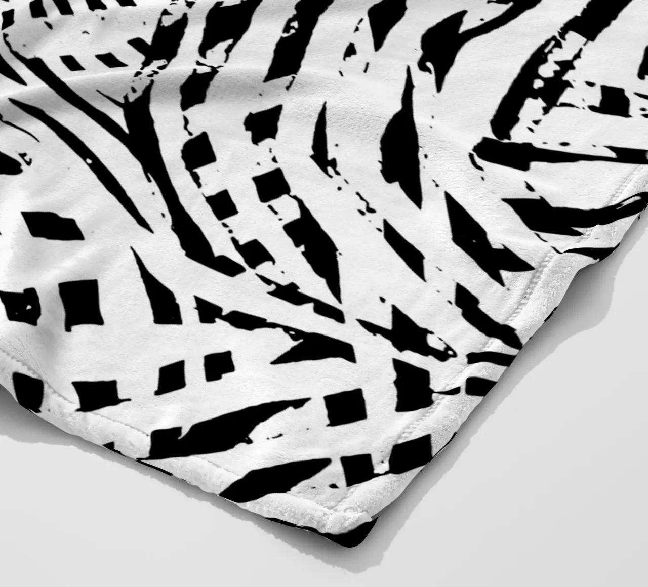 Black Lines fleece blanket by Studio ROSAGRAU