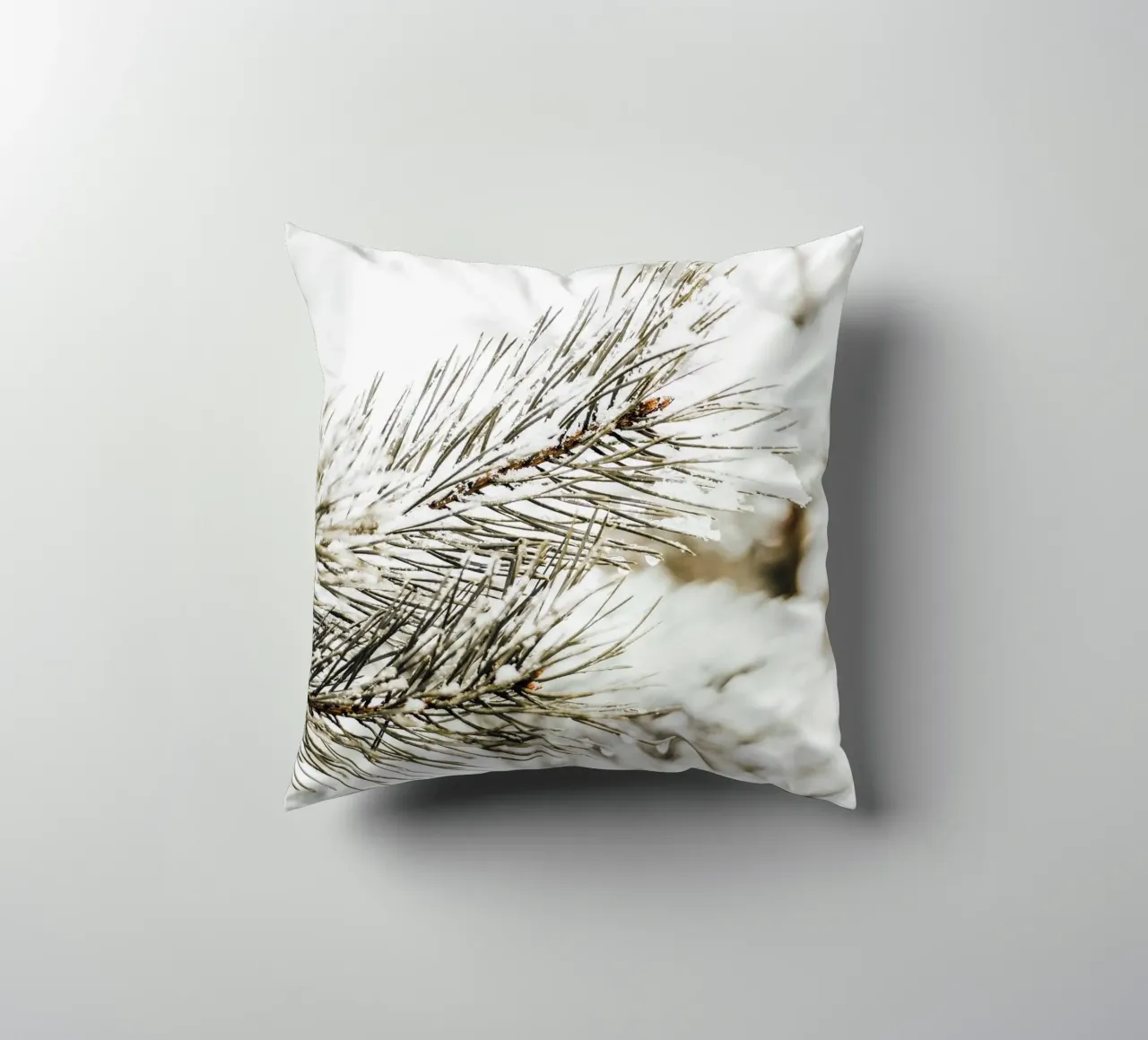 Snowy fir branch - Winter nature photography decorative cushion by Whole©