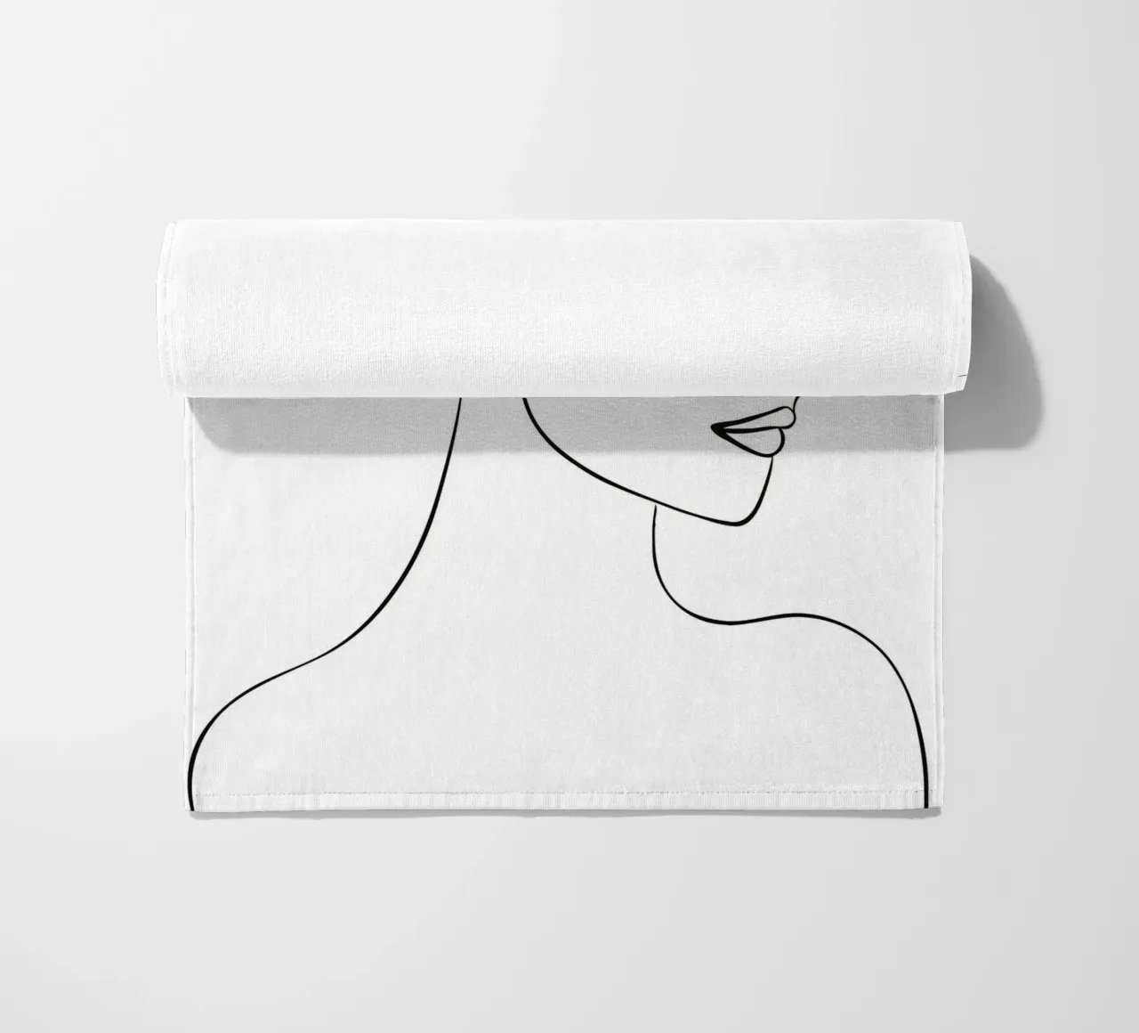Woman's profile with a serene expression strandhanddoek van LisaArtes