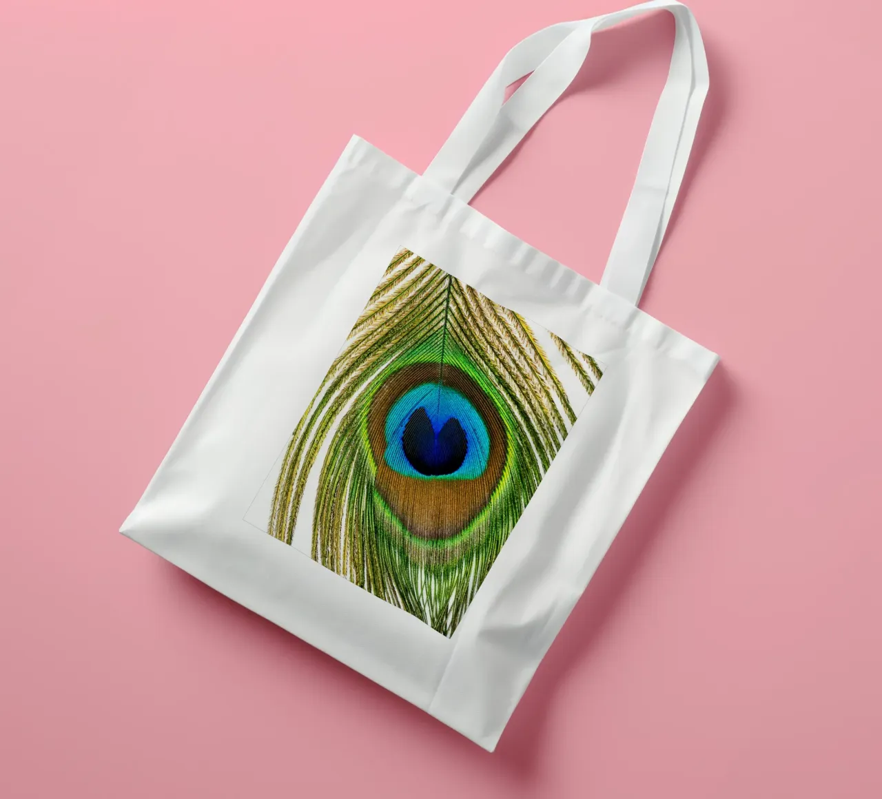 Peacock Feather – A Symbol of Elegance and Vibrance tote bag by Curious Collections by Marielle Leenders