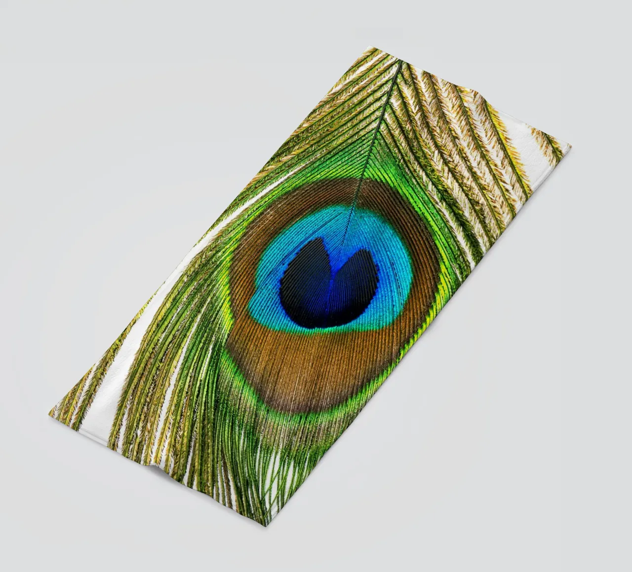 Peacock Feather – A Symbol of Elegance and Vibrance beach towel by Curious Collections by Marielle Leenders