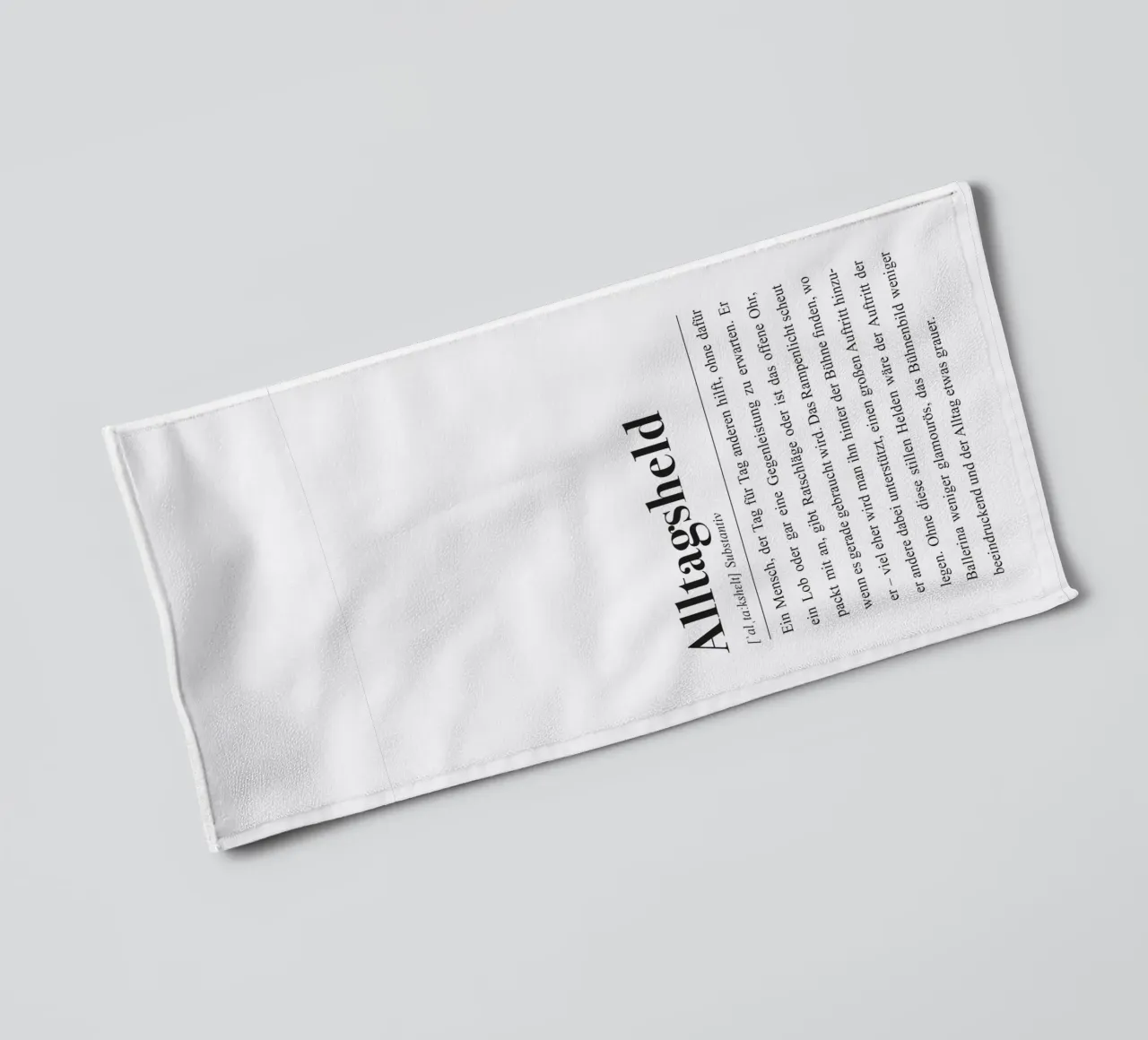 Everyday hero: definition in the style of a dictionary towel by Pulse of Art