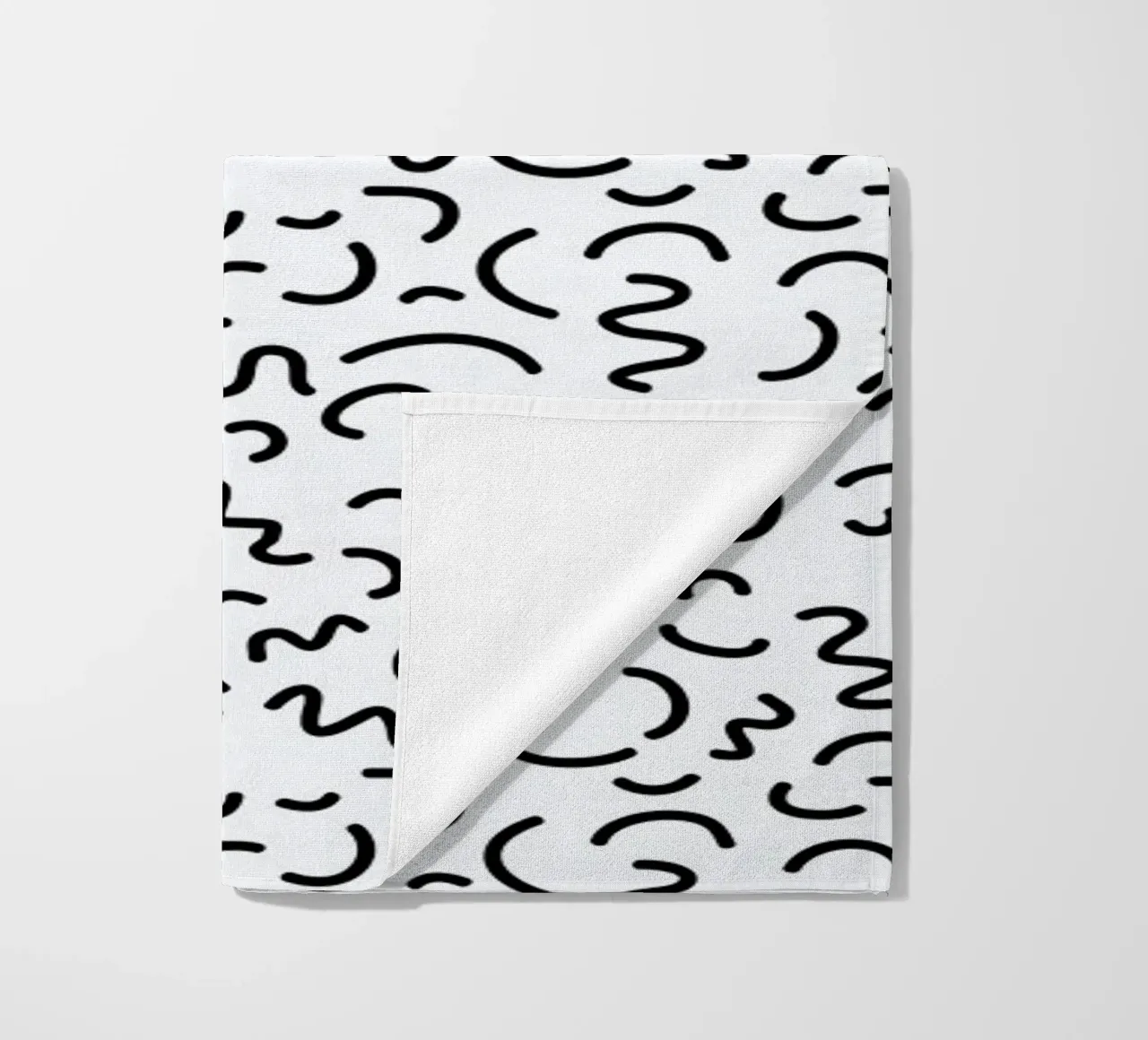 Memphis Squiggle telo mare da Charlotte Winter