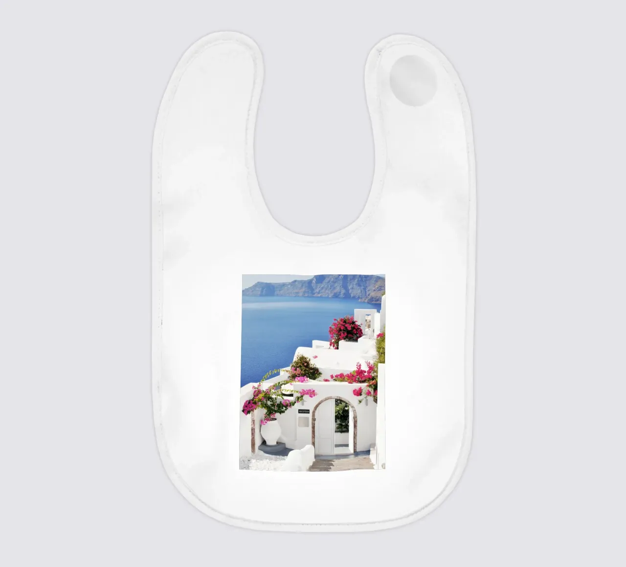 Santorini Grecia con i fiori di Bougainvillea, Isole greche bavaglino da TheTravelClub