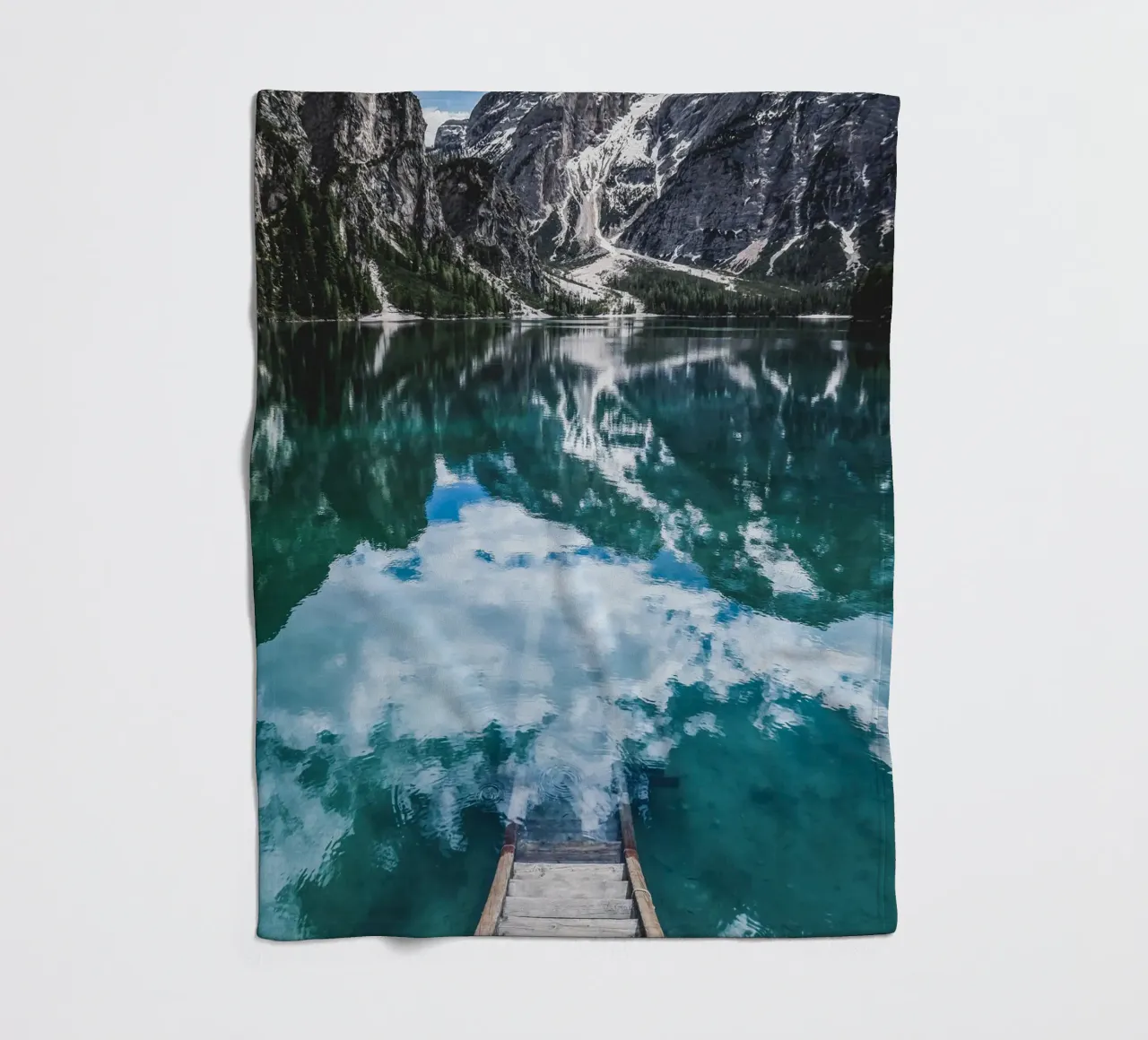 Reflecting mountain lake with jetty fleece blanket by Whole©