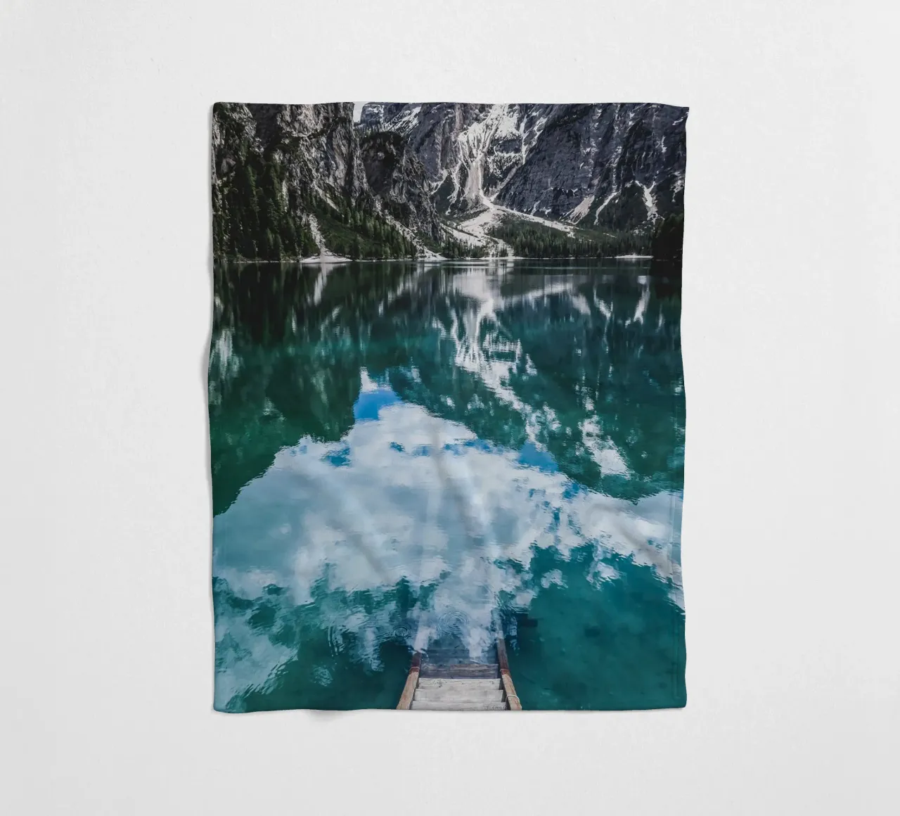 Reflecting mountain lake with jetty fleece blanket by Whole©