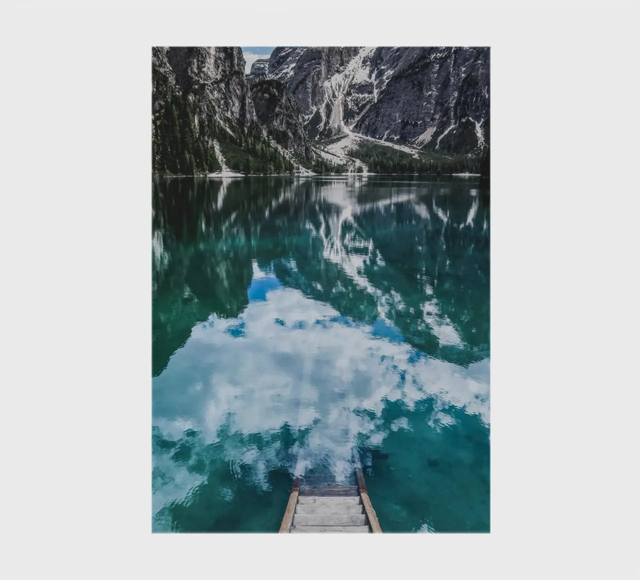 Reflecting mountain lake with jetty notebook by Whole©