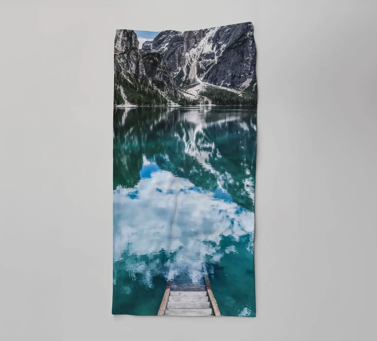 Reflecting mountain lake with jetty towel by Whole©